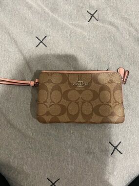 Coach Brown Signature Canvas Wristlet with Pink Trim